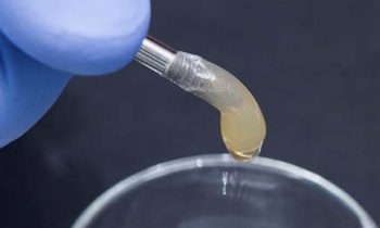 Implant powleczony biomateriałem